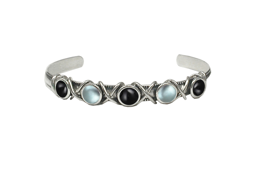 Sterling Silver Cuff Bracelet With Black Onyx And Blue Topaz